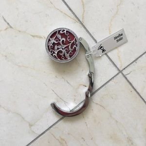 NWT foldable bag hanger